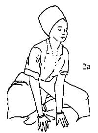 Come into a squatting position (Frog Pose)
